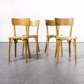 Chaises de salle à manger en hêtre blond Baumann des années 1950 - Ensemble de quatre (modèle 1402)