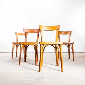 Chaises de salle à manger Honey Baumann à barre unique en bois courbé, années 1950 - Ensemble de quatre