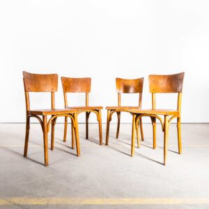 1940's Large Honey Shield Back With A Flat Curved-Edged Seat Dining Chairs - Set Of Four